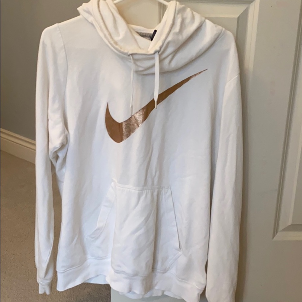 Nike rose gold hoodie.